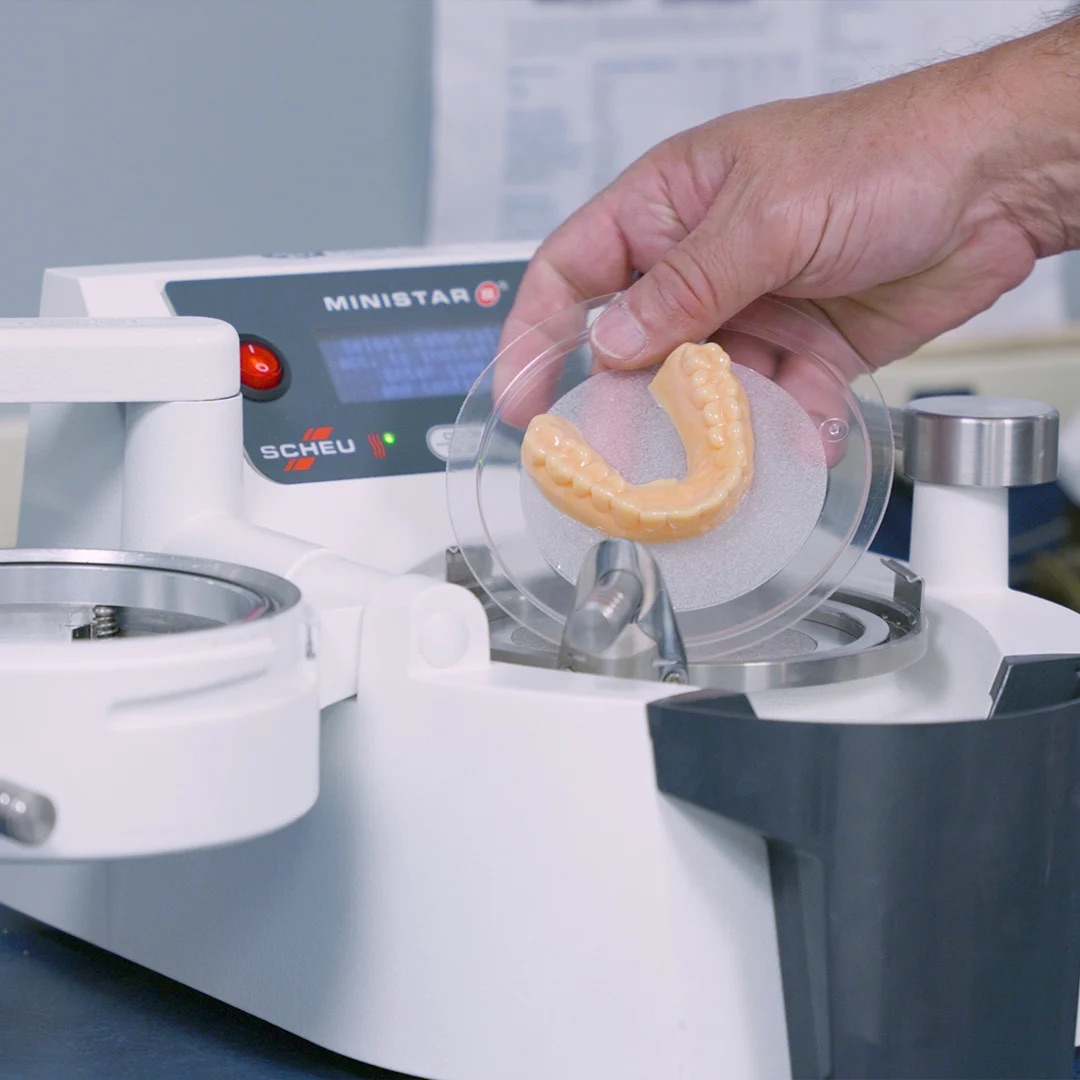 MiniSTAR S® with Scan Technology in lab setting, holding finished formed appliance